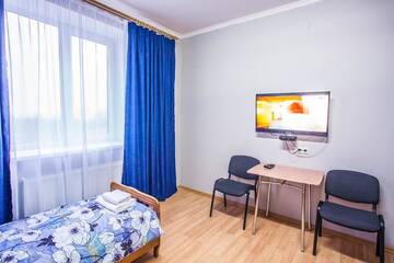 Фото номера Стандартный двухместный номер с 2 отдельными кроватями Дома для отпуска Агроусадьба Абузерье г. Abuzierje 6